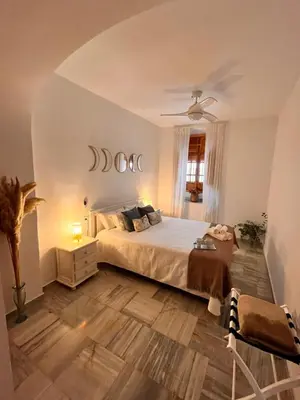 Cama o camas de una habitación en La casa de Tachi