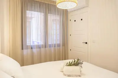 Cama o camas de una habitación en Sentir Jaén I
