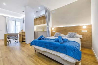 Cama o camas de una habitación en Apartamento La Victoria & Centro & Parking