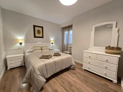 Cama o camas de una habitación en DS Santa Marina Escapada con Encanto, parking opcional