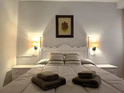 Cama o camas de una habitación en DS Santa Marina Escapada con Encanto, parking opcional