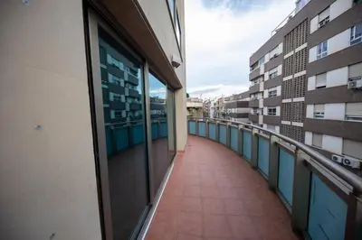 Un balcón o terraza de RentitSpain - Jaén - Ático Exlusivo con Balcón Curvo en el Centro