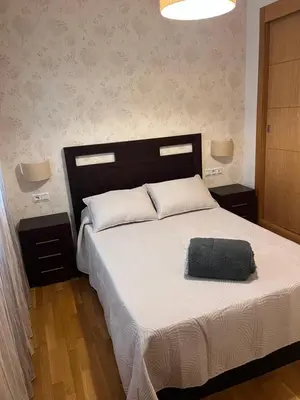 Cama o camas de una habitación en Piso céntrico en zona monumental de Antequera