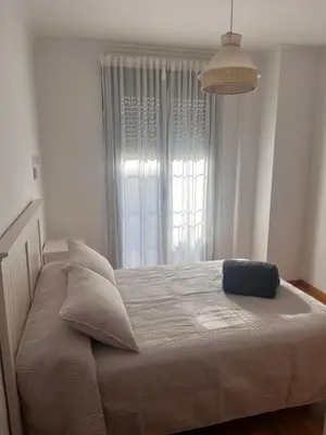 Cama o camas de una habitación en Piso céntrico en zona monumental de Antequera
