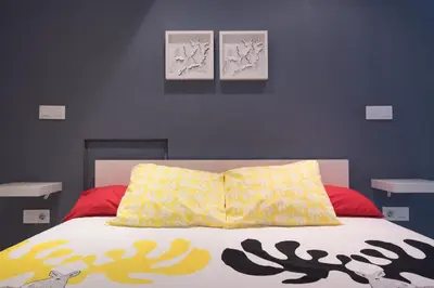 Cama o camas de una habitación en Alohamundi Amador de los Rios