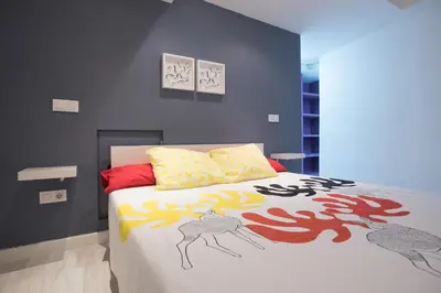 Cama o camas de una habitación en Alohamundi Amador de los Rios