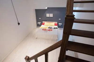 Cama o camas de una habitación en Alohamundi Amador de los Rios