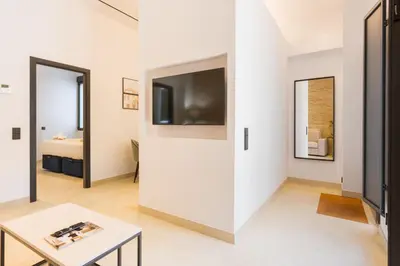 Una televisión o centro de entretenimiento en New Design Apartment - Gallos 4
