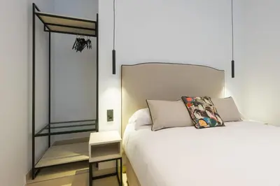 Cama o camas de una habitación en New Design Apartment - Private patio - Gallos 3