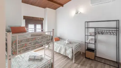 Cama o camas de una habitación en Casa del Río en Villanueva Villanueva de la Concepción by Ruralidays