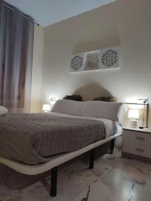 Cama o camas de una habitación en apartamentos barrio nuevo