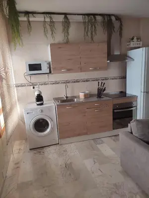 Una cocina o zona de cocina en apartamentos barrio nuevo
