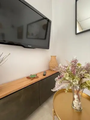 Una televisión o centro de entretenimiento en Vivir Arpisama