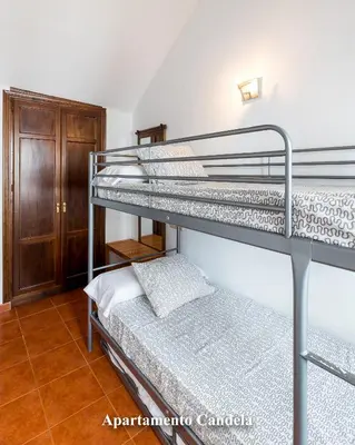 Cama o camas de una habitación en Apartamentos Candela Alora