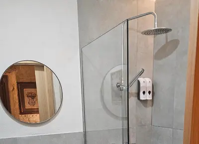 Un baño de Arena Centro Rooms&Suites, by Homing U