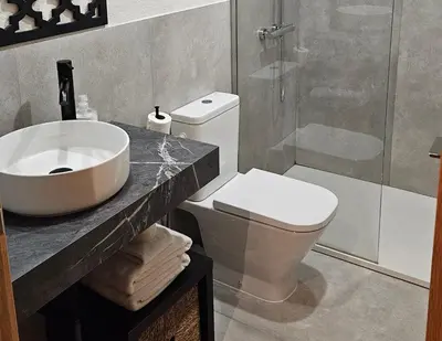 Un baño de Arena Centro Rooms&Suites, by Homing U