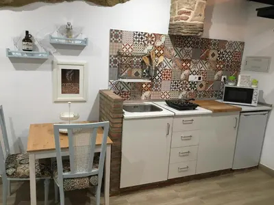 Una cocina o zona de cocina en Casas Rurales El Tajo