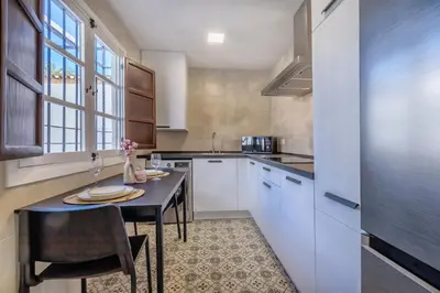 Una cocina o zona de cocina en Alminar Suites