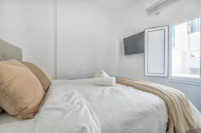 Cama o camas de una habitación en Alminar Suites