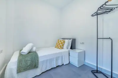 Cama o camas de una habitación en Alminar Suites
