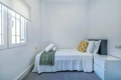 Cama o camas de una habitación en Alminar Suites