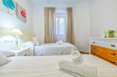 Cama o camas de una habitación en Altillo Sweet Home & Parking incluido