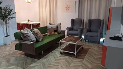 Zona de estar de Centro Linares Santiago B&A