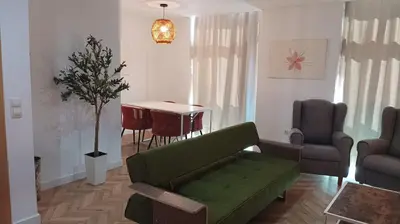 Zona de estar de Centro Linares Santiago B&A