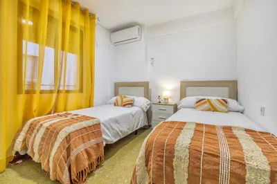Cama o camas de una habitación en Apartamento Violeta & Centro
