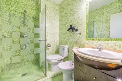 Un baño de Apartamento Violeta & Centro