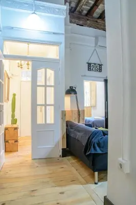 Cama o camas de una habitación en Posada Alameda de Hércules