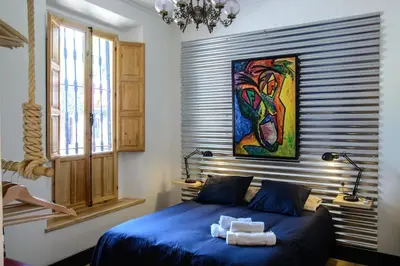 Cama o camas de una habitación en Posada Alameda de Hércules