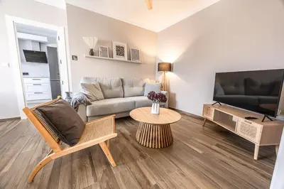 Una televisión o centro de entretenimiento en Apartamento tranquilo 