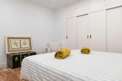 Cama o camas de una habitación en La Bodega Con Parking Gratis