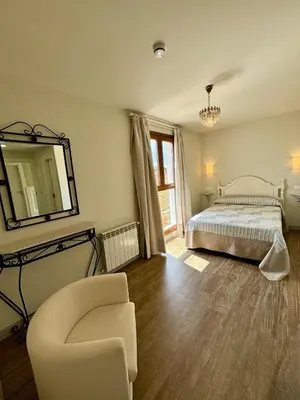 Cama o camas de una habitación en Hotel Restaurante Paneque
