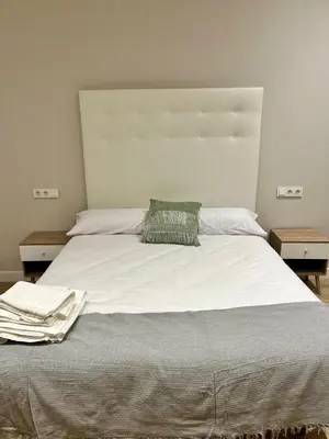 Cama o camas de una habitación en Jardines Suites GP