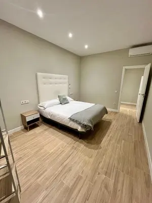 Cama o camas de una habitación en Jardines Suites GP