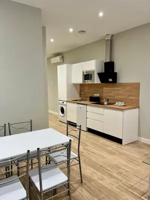 Una cocina o zona de cocina en Jardines Suites GP