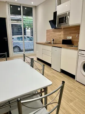 Una cocina o zona de cocina en Jardines Suites GP
