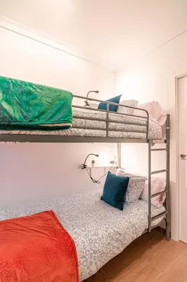 Cama o camas de una habitación en Edomus El Patio de la Macarena