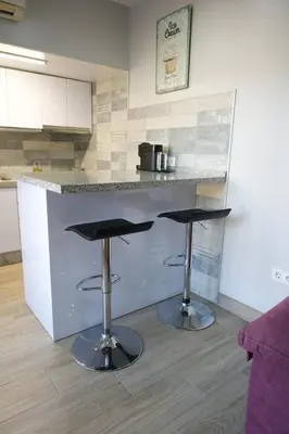 Una cocina o zona de cocina en Apartamentos turísticos ilusiones