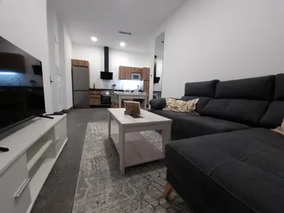 Una televisión o centro de entretenimiento en CARMELO APARTAMENTo