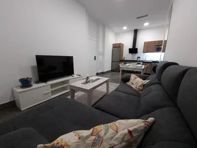 Una televisión o centro de entretenimiento en CARMELO APARTAMENTo