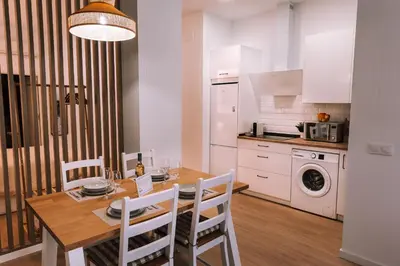 Una cocina o zona de cocina en Optimum Sevilla Loft Boutique
