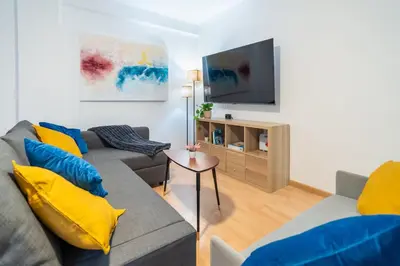 Una televisión o centro de entretenimiento en Apartamento a 15 minutos de la Judería con Parking