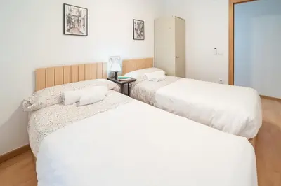 Cama o camas de una habitación en Apartamento a 15 minutos de la Judería con Parking