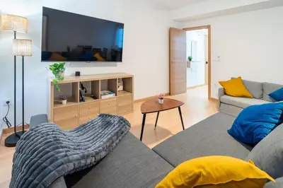 Una televisión o centro de entretenimiento en Apartamento a 15 minutos de la Judería con Parking