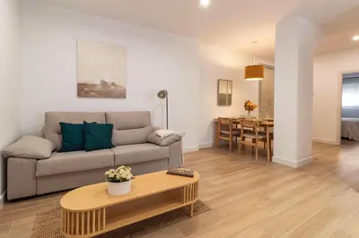 Zona de estar de Nuevo y Acogedor Piso junto a Santa Justa y Aeropuerto 3
