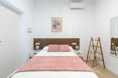 Cama o camas de una habitación en La Flor de Sevilla