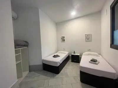 Cama o camas de una habitación en Center Verónica Confort